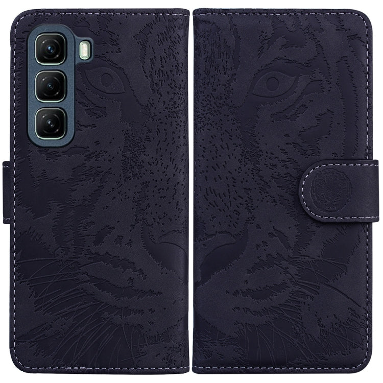Dark blue tiger-embossed wallet-style flip phone case with magnetic side strap.