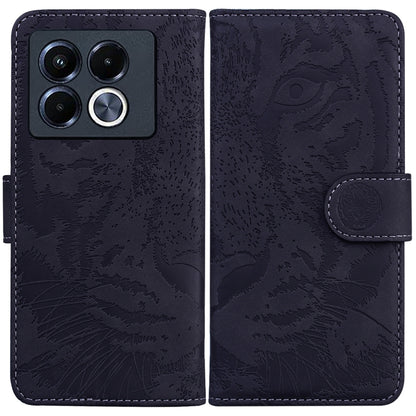 Tiger embossed flip leather phone case, dark navy with magnetic strap closure.