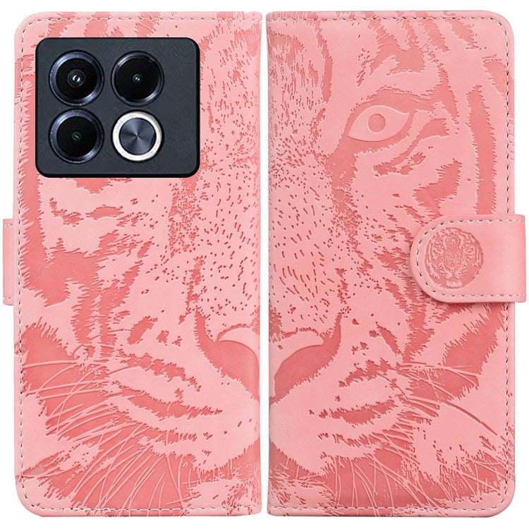 Tiger embossed flip leather phone case, pink with camera cutout and magnetic strap.