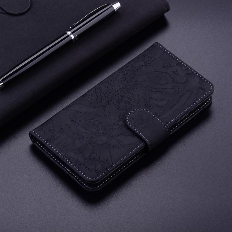 Tiger-embossing leather flip phone case, dark navy, with fold-over front and card holder.