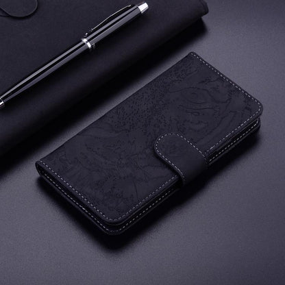 Tiger-embossing leather flip phone case, dark navy, with fold-over front and card holder.