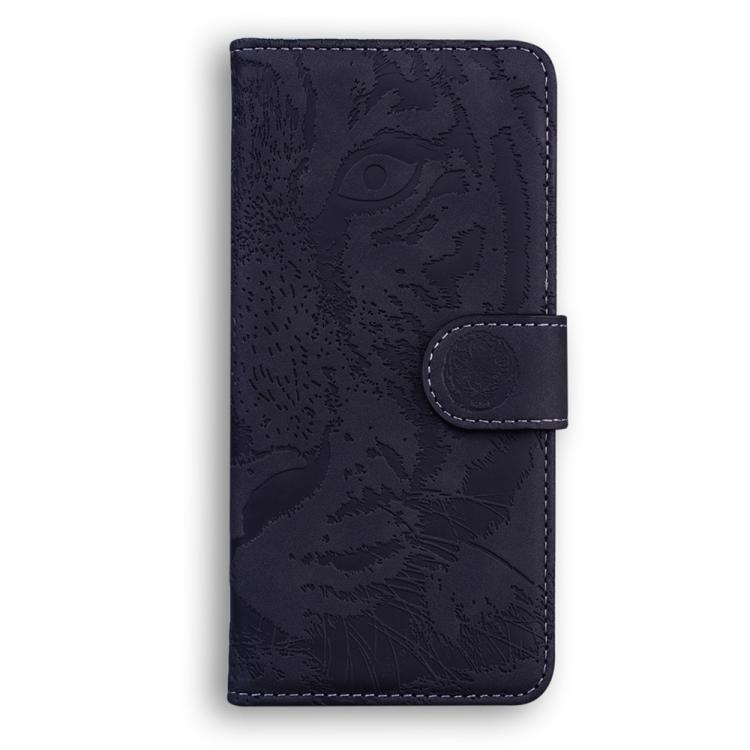 Tiger-embossing leather flip phone case, dark navy, fold-over cover with circular clasp tab.