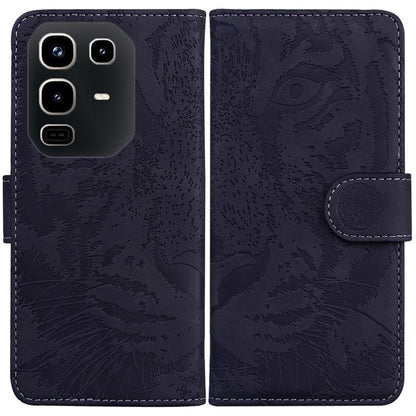 Dark navy tiger-embossed flip leather phone case with card slot and magnetic strap.