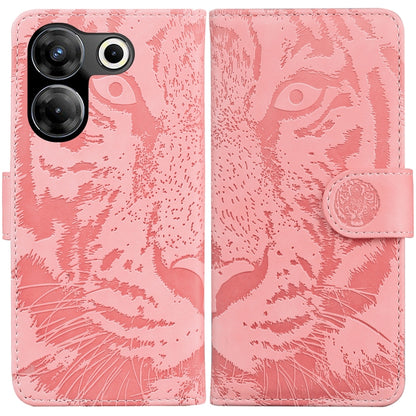 Tiger embossed flip phone case in pink with coin-style snap strap