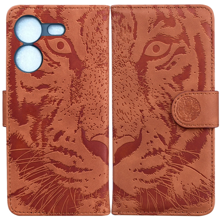 Tiger embossed flip phone case in brown with coin-style snap strap