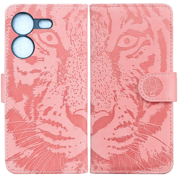 Tiger embossed flip phone case in pink with coin-style snap strap