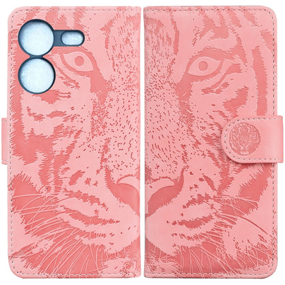 Tiger embossed flip phone case in pink with coin-style snap strap