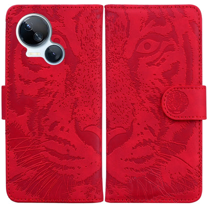 Tiger embossed flip phone case in red with coin-style snap strap