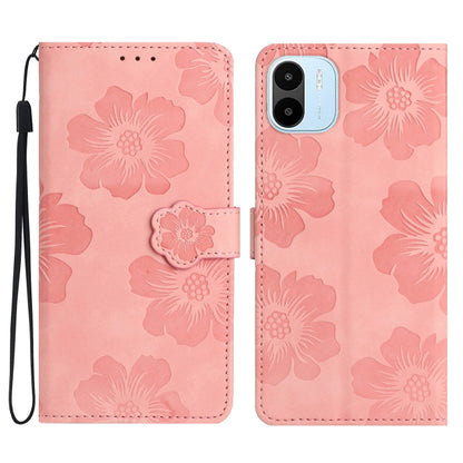 Pink embossed floral leather phone wallet case with magnetic strap.