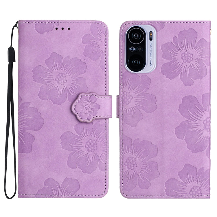 Purple embossed flower leather wallet phone case with magnetic flap and wrist strap