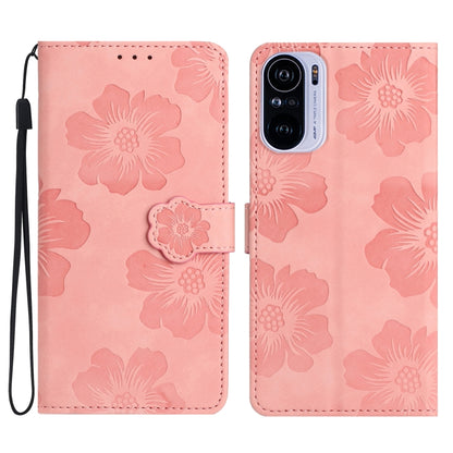 Pink embossed flower leather wallet phone case with magnetic flap and wrist strap