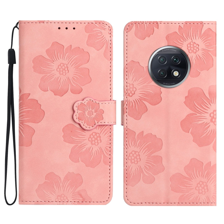 Pink leather flip phone case with embossed floral pattern and wrist strap