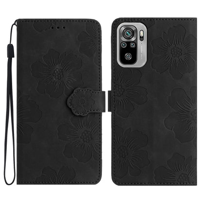 Black floral embossed leather phone case with magnetic flip and wrist strap