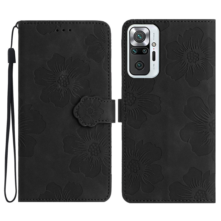 Black embossed leather phone case with floral pattern, magnetic flap and wrist strap.
