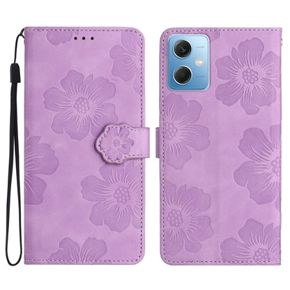 Purple embossed flower leather flip phone case with wrist strap and camera cutout