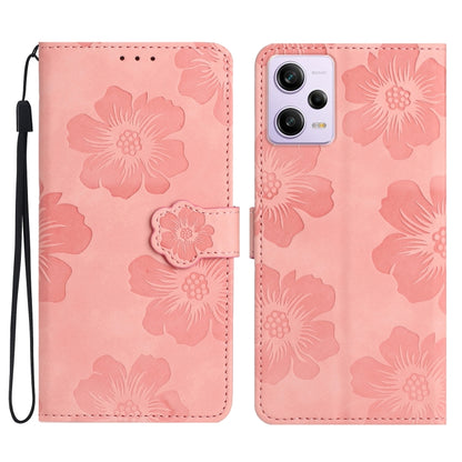 Pink embossed flower leather flip phone case with wrist strap and camera cutout