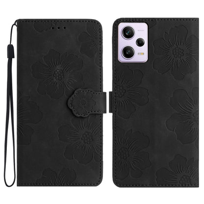 Black floral embossed leather wallet phone case with wrist strap and magnetic flap