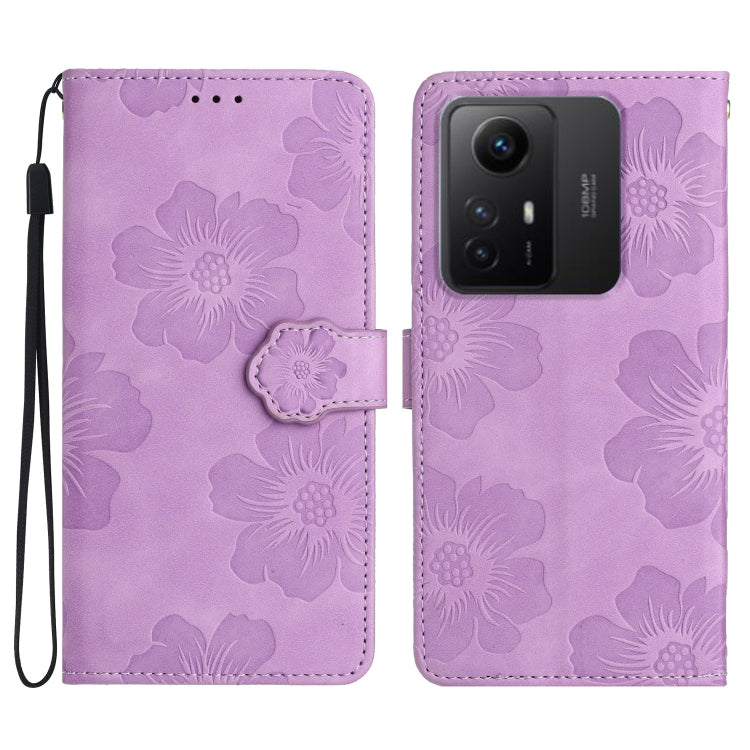Purple floral embossed leather wallet phone case with wrist strap and magnetic flap