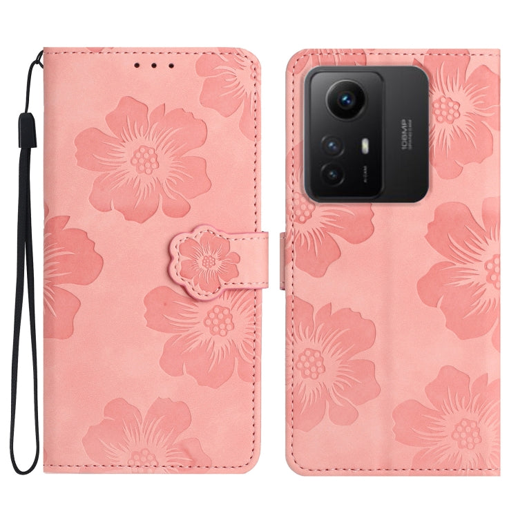 Pink floral embossed leather wallet phone case with wrist strap and magnetic flap