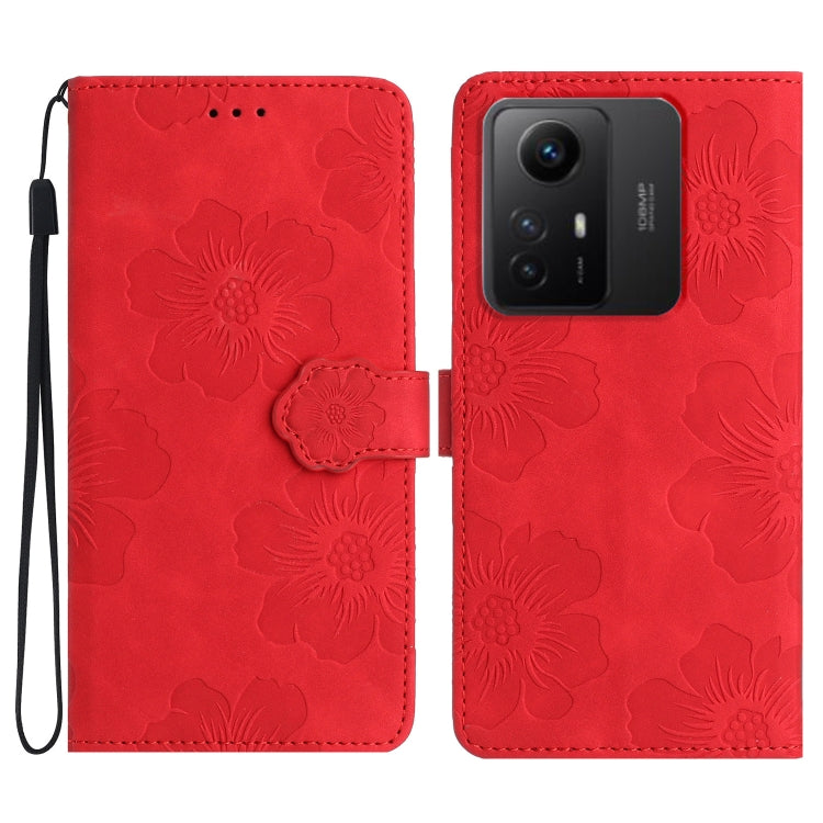 Red floral embossed leather wallet phone case with wrist strap and magnetic flap