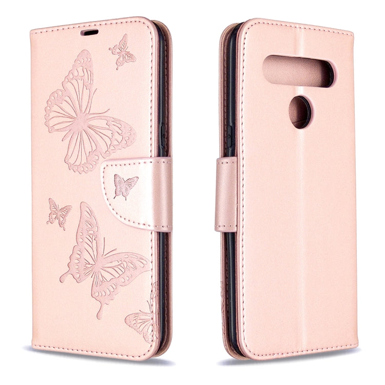 Pink leather-style flip phone case with embossed butterfly pattern and cutouts on back