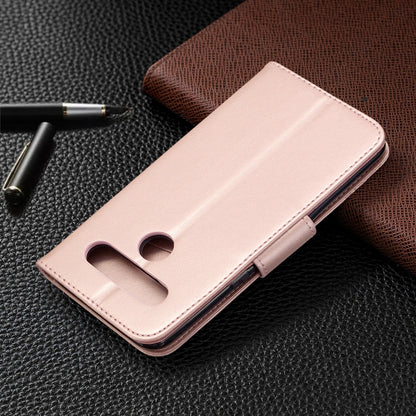 Pink leather-style phone case showing back cutouts and stitched flip cover