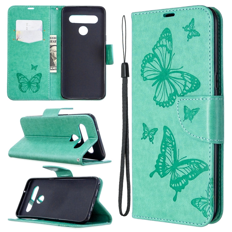 Teal phone wallet case with butterfly emboss, flip stand, card slot, wrist strap.