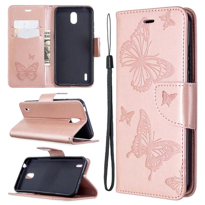Rose pink phone wallet case with butterfly emboss, flip stand, card slot, wrist strap.