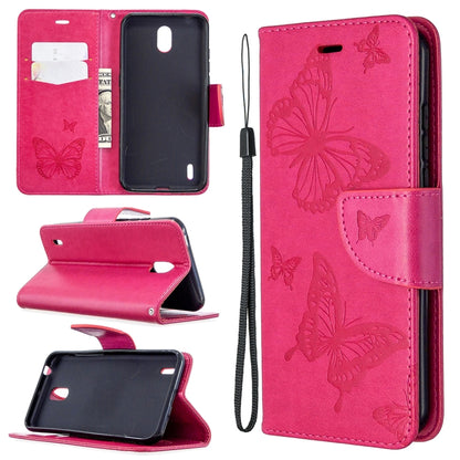 Pink phone wallet case with butterfly emboss, flip stand, card slot, wrist strap.