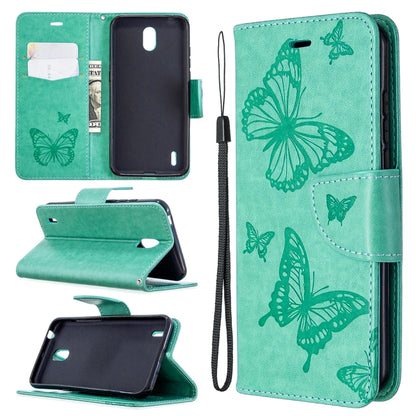 Teal phone wallet case with butterfly emboss, flip stand, card slot, wrist strap.