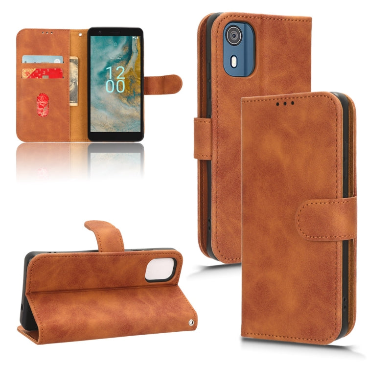 Brown magnetic flip leather phone case with front card compartment