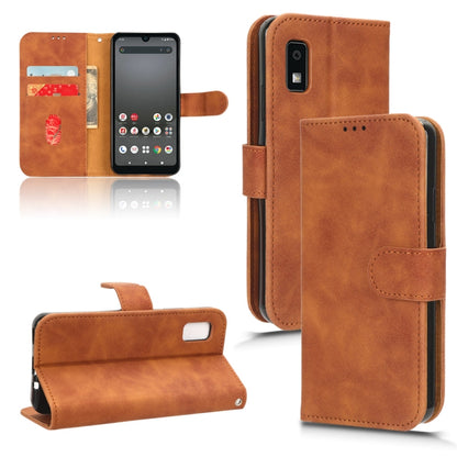 Brown flip leather phone case with card slot and side phone camera cutout