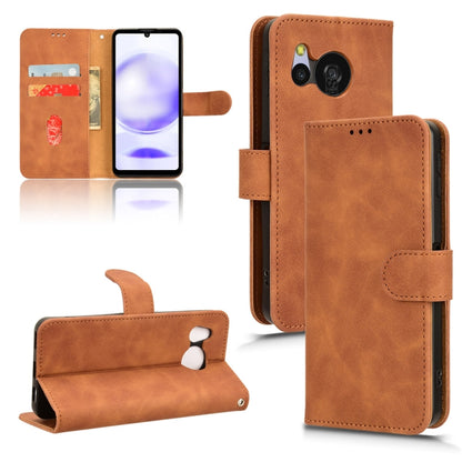 Brown flip leather phone case, front cover folded open with camera cutout and kickstand