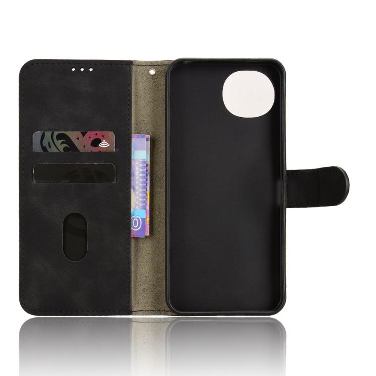 Black magnetic flip leather phone case, open view with inner card slots and phone holder
