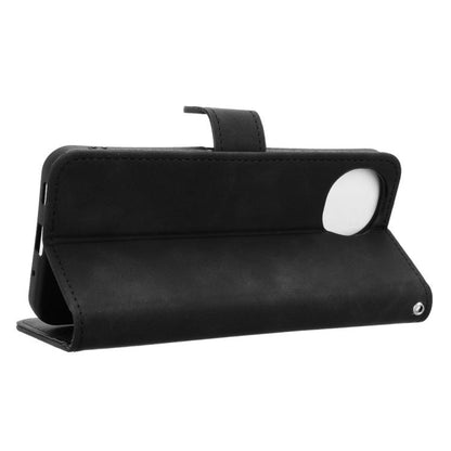 Black magnetic flip leather phone case shown as a horizontal stand with camera cutout