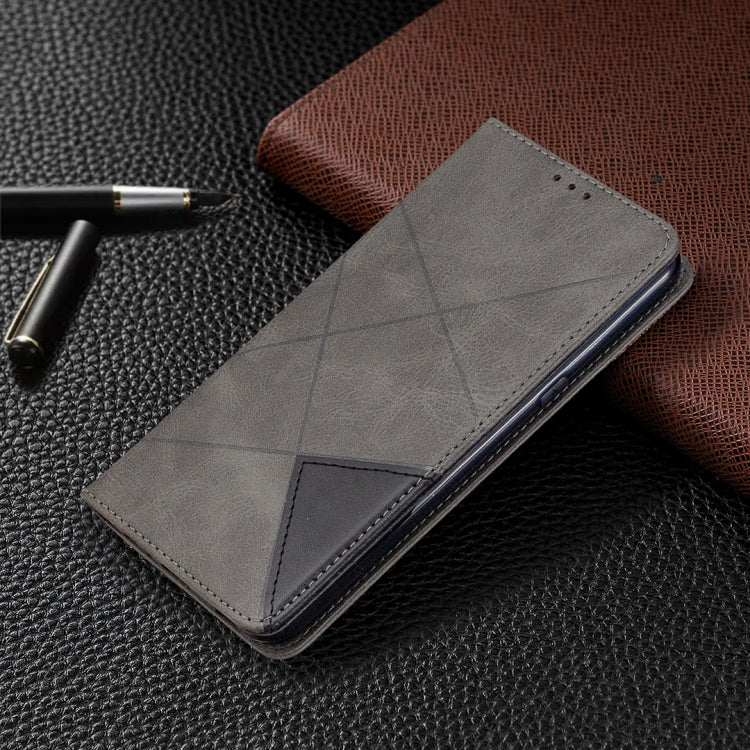 Grey flip wallet phone case with rhombus texture and diagonal corner panel