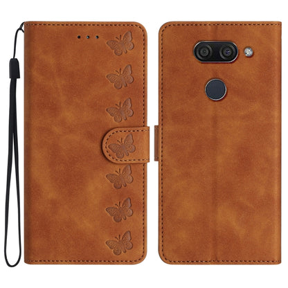Brown embossed butterfly leather-style phone case with flip closure and wrist strap.