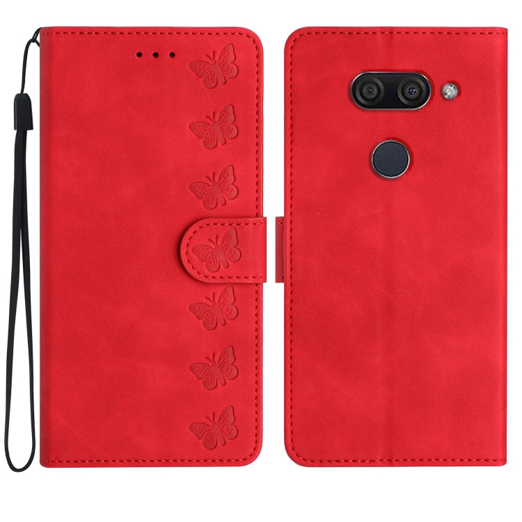 Red embossed leather phone case with butterfly pattern, flip cover and wrist strap.