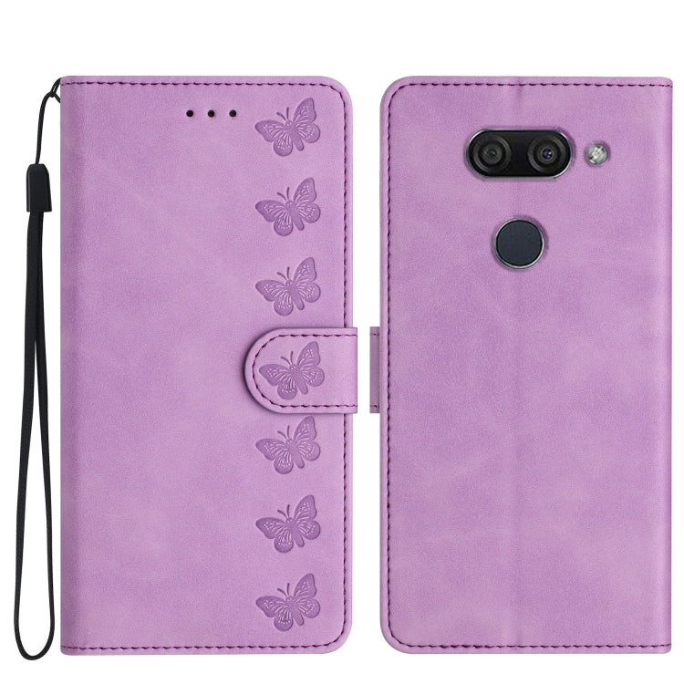 Purple embossed leather phone case with butterfly pattern, flip cover and wrist strap.