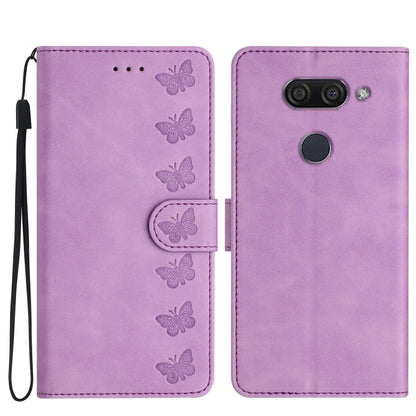 Purple embossed leather phone case with butterfly pattern, flip cover and wrist strap.