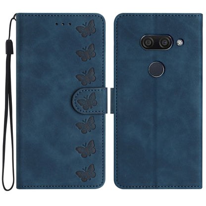Blue embossed butterfly leather wallet phone case with dual-camera cutout and wrist strap.