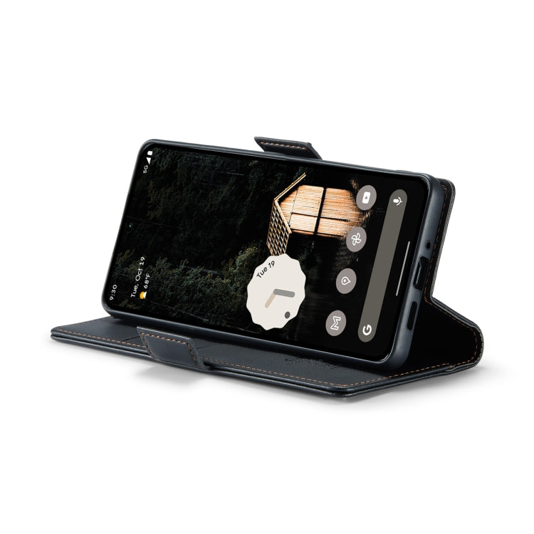 Black litchi-texture leather flip phone case with secure strap and camera window
