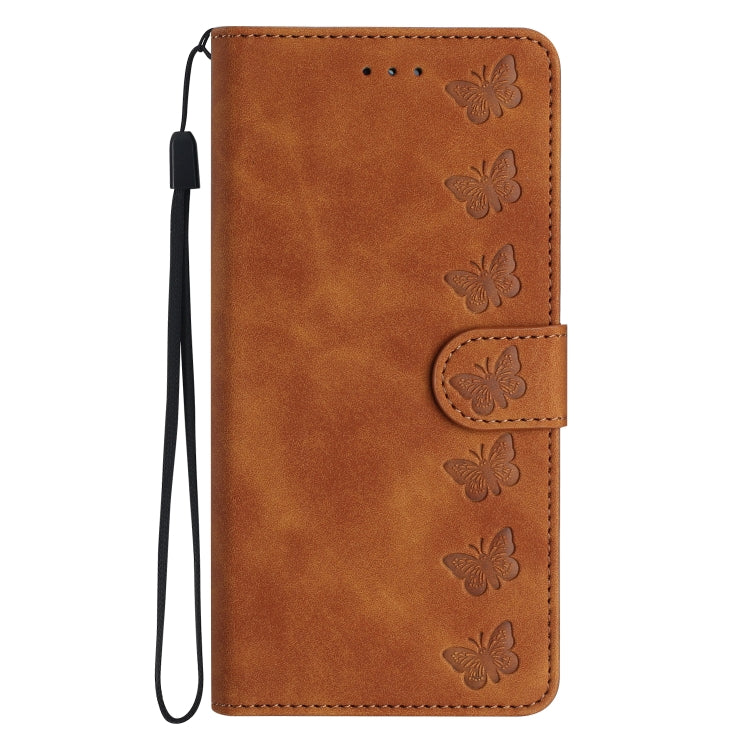 Brown embossed leather phone case with butterfly pattern and side wrist strap