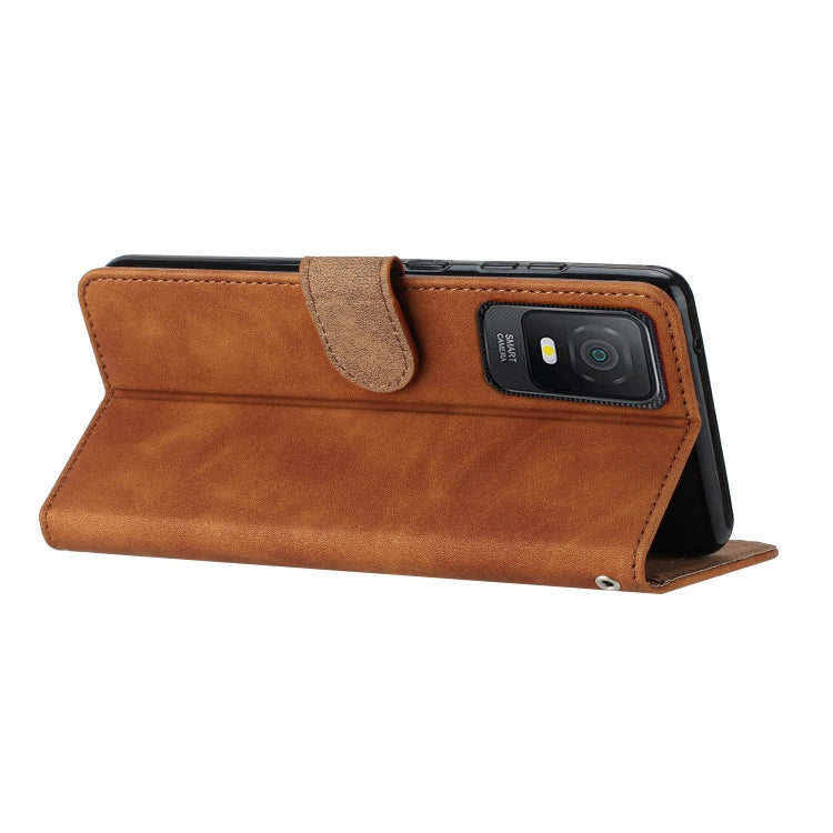 Brown leather folio phone case with flip cover and camera window, side view