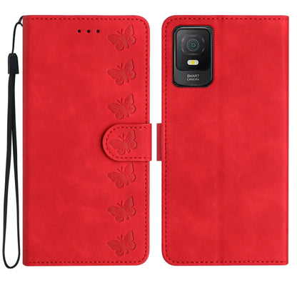 Red embossed leather phone wallet case with butterfly design and wrist strap