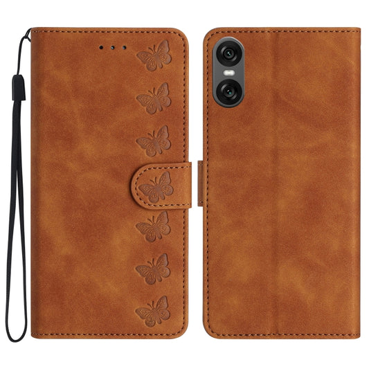 Brown embossed leather phone case with butterfly pattern and flip cover