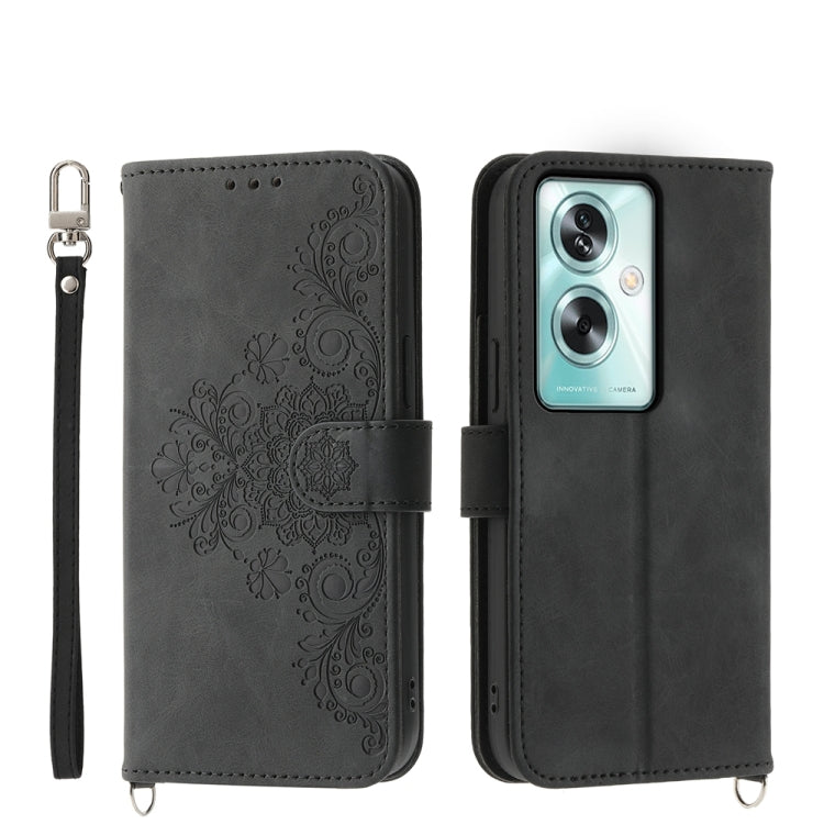 Dark gray leather phone wallet case with embossed floral design, camera cutout, strap
