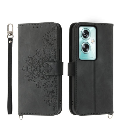 Dark gray leather phone wallet case with embossed floral design, camera cutout, strap