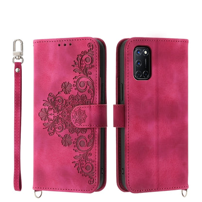 Pink leather phone wallet case with embossed floral mandala and wrist strap