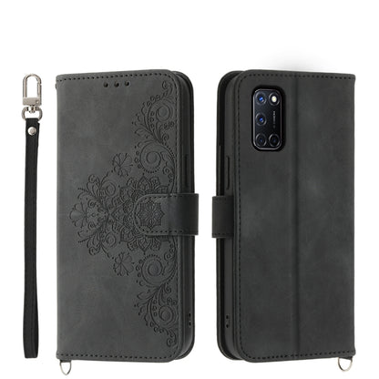 Dark gray leather phone wallet case with embossed floral design and wrist strap